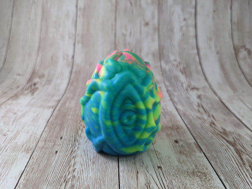 Many Eyed Creature Egg Size Large (Medium firmness) Rainbow